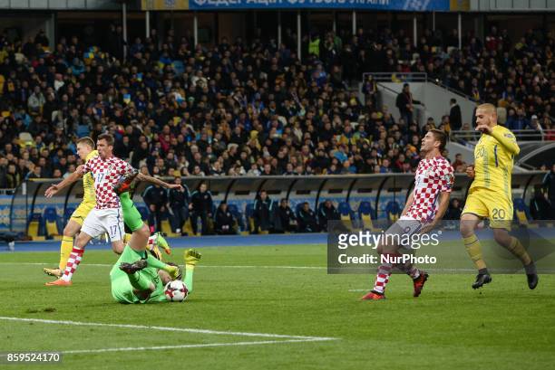 Croatian player Andrej Kramaric, vies Ukrainian defender Yaroslav Rakitskiy and goalkeeper Andriy Pyatov of Ukraine during the FIFA 2018 World Cup...