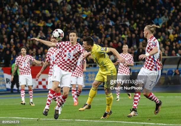 Yevhen Konoplyanka of Ukraine vies Croatiaa's defender Matej Mitrovic and Domagoj Vida during the FIFA 2018 World Cup Group I Qualifier between...