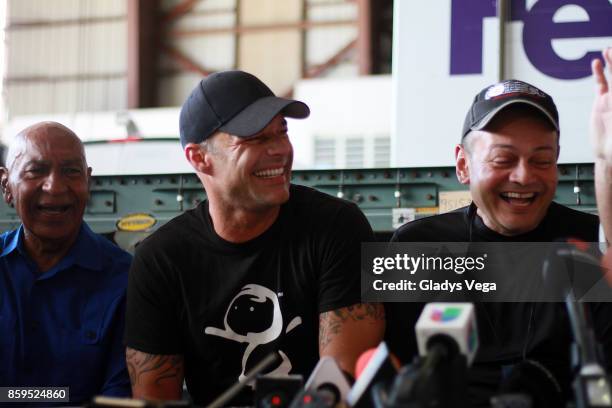 Ricky Martin with Mayor of Aguadilla Carlos Mendez and Mayor of Anasco, Jorge Estevez speak to the media after Ricky Martin's arrival on a FedEx...