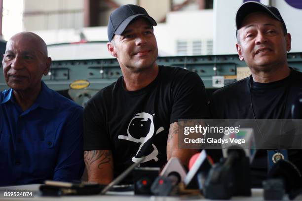 Ricky Martin with Mayor of Aguadilla Carlos Mendez and Mayor of Anasco, Jorge Estevez speak to the media after Ricky Martin's arrival on a FedEx...