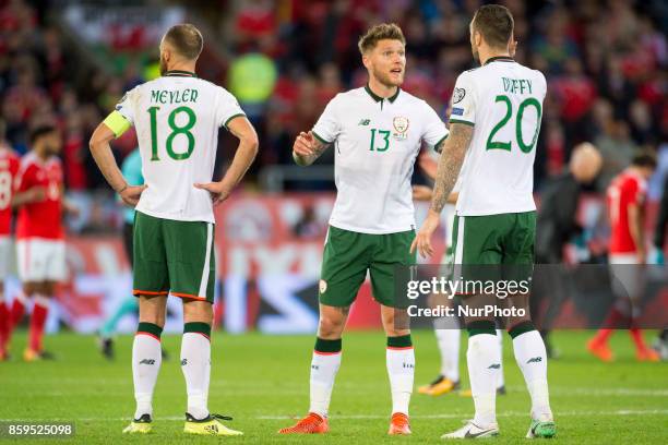 David Meyler , Jeff Hendrick and Shane Duffy of Ireland talk each other during the FIFA World Cup 2018 Qualifying Round Group D match between Wales...