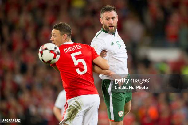 Daryl Murphy of Ireland and James Chester of Wales during the FIFA World Cup 2018 Qualifying Round Group D match between Wales and Republic of...