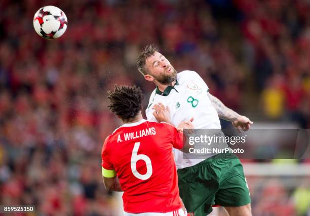 Daryl Murphy of Ireland and Ashley Williams of Wales during the FIFA World Cup 2018 Qualifying Round Group D match between Wales and Republic of...