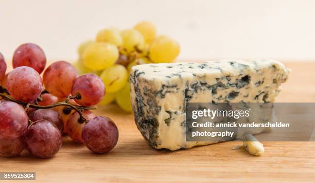 grapes and blue d'auvergne. - vein stock pictures, royalty-free photos & images