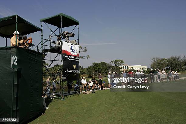 ShotLink volunteers, The Golf Channel cameraman and the gallery during the second round of the Allianz Championship held at The Old Course at Broken...