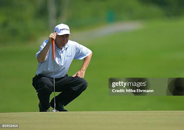 Jeff Sluman lines up a putt on the 17th hole during the second round of the Mayakoba Golf Classic at El Camaleon at Mayakoba in Playa Del Carmen,...