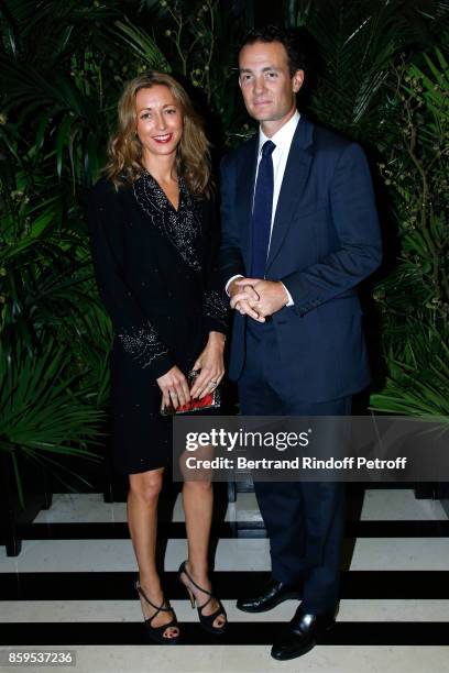 Baron Alexandre de Rothschild and his wife Olivia de Rothschild attend the "Diner des Amis de Care" at Hotel Peninsula Paris on October 9, 2017 in...