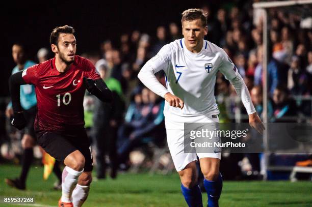 Turkey's Hakan Calhanoglu and Finland's Robin Lod during the FIFA World Cup 2018 qualification football match between Finland and Turkey in Turku,...