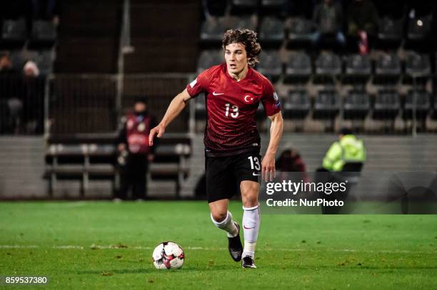 Caglar Soyuncu of Turkey runs with the ball during the FIFA World Cup 2018 qualifying football match between Finland and Turkey in Turku, Southern...