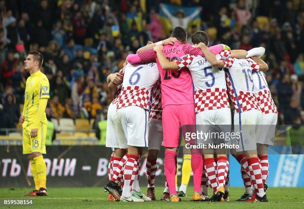 Croatia players celebrate the victory after the World Cup Group I qualifying soccer match between Ukraine and Croatia at the Olympic Stadium in Kiev....