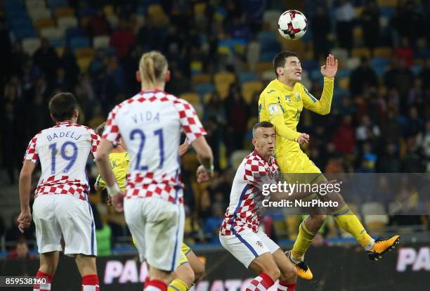 Ukraine's Taras Stepanenko, right, and Croatia's Ivan Perisic, left, in the fight for the ball during the World Cup Group I qualifying soccer match...