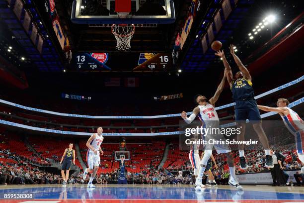 Ike Anigbogu of the Indiana Pacers shoots the ball against the Detroit Pistons on October 9, 2017 at Little Caesars Arena in Detroit, Michigan. NOTE...