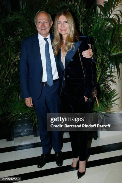 Chairman & Chief Executive Officer of L'Oreal Jean-Paul Agon and his wife Sophie attend the "Diner des Amis de Care" at Hotel Peninsula Paris on...