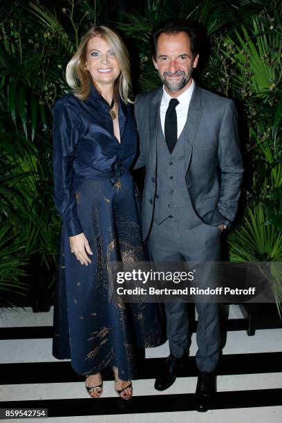 President of Care France, Arielle de Rothschild and Stephane de Groodt attend the "Diner des Amis de Care" at Hotel Peninsula Paris on October 9,...