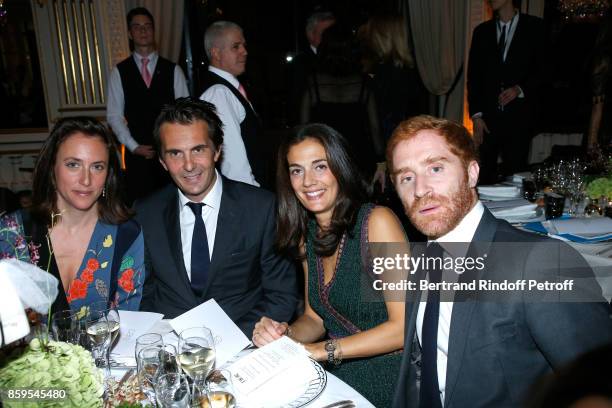 Anne-Charlotte Houze, CEO of Havas, Yannick Bollore, Stephanie de Rothschild and Fritz Rossi attend the "Diner des Amis de Care" at Hotel Peninsula...