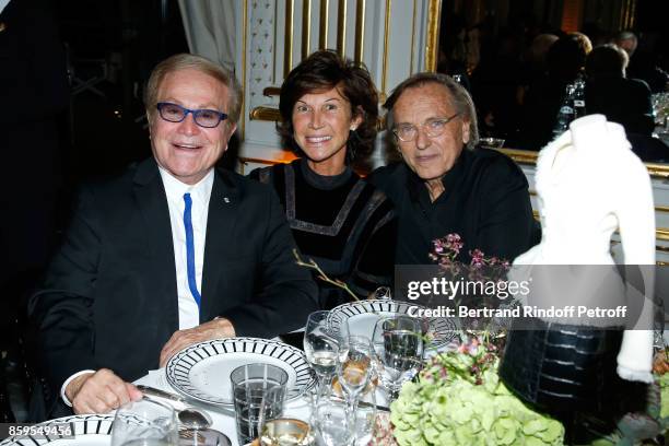 Orlando, Sylvie Rousseau and Alexandre Arcady attend the "Diner des Amis de Care" at Hotel Peninsula Paris on October 9, 2017 in Paris, France.