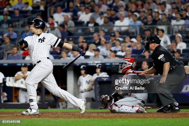 Gary Sanchez of the New York Yankees hits a solo home run to right field against Bryan Shaw of the Cleveland Indians during the seventh inning in...