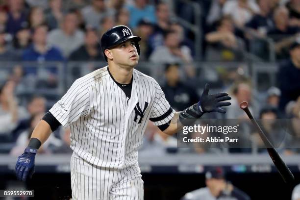 Gary Sanchez of the New York Yankees hits a solo home run to right field against Bryan Shaw of the Cleveland Indians during the seventh inning in...