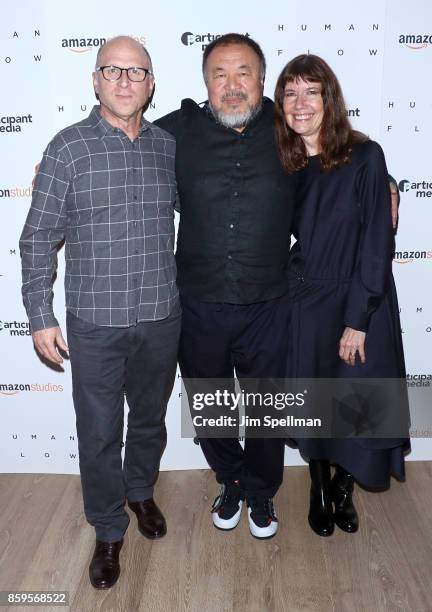 Producer Bob Berney, director/artist Ai Weiwei and Diane Weyermann attend the "Human Flow" New York screening at the Whitby Hotel on October 9, 2017...