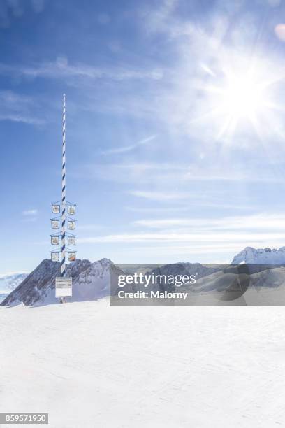 may pole at zugspitze. zugspitze, bavaria, germany. - ski pole stock-fotos und bilder