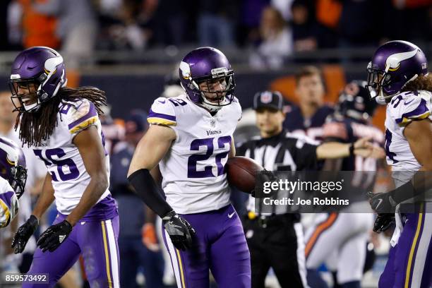 Harrison Smith of the Minnesota Vikings reacts after intercepting the football in the fourth quarter against the Chicago Bears at Soldier Field on...