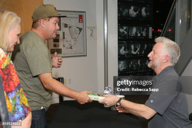 Billy Bragg spigns for fans at Roots, Radicals and Rockers: How Skiffle Changed the World With Billy Bragg at The GRAMMY Museum on October 9, 2017 in...