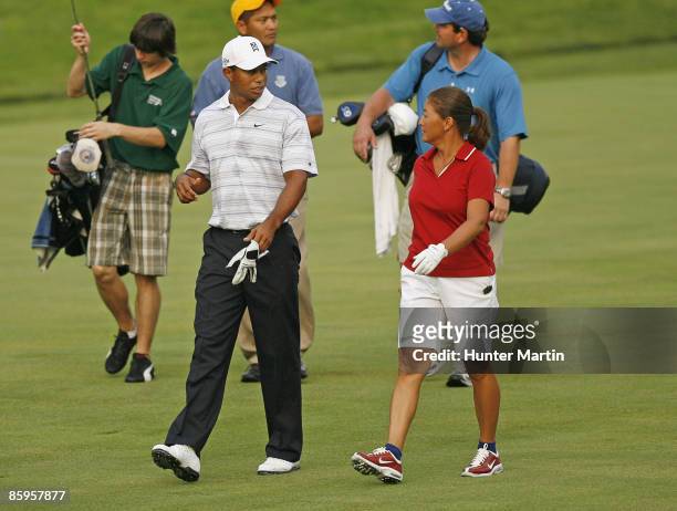 Sergeant Major Mia Kelly and Tiger Woods during the AT&T National Earl Woods Memorial Pro-Am at Congressional Country Club on July 4, 2007 in...