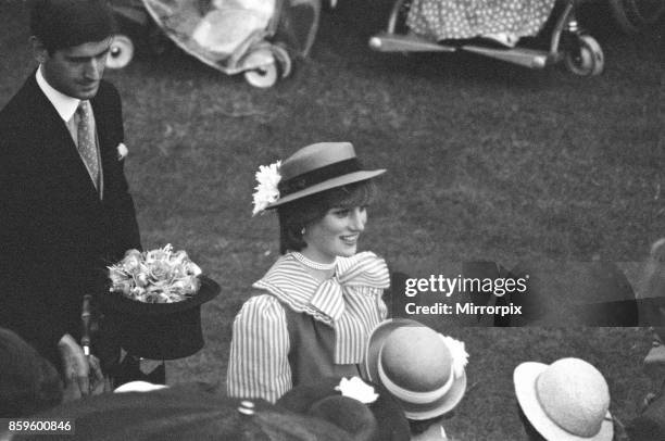 Lady Diana Spencer attends her first ever Garden Party at Buckingham Palace. In this picture Lady Diana also talks to guests about her engagement...