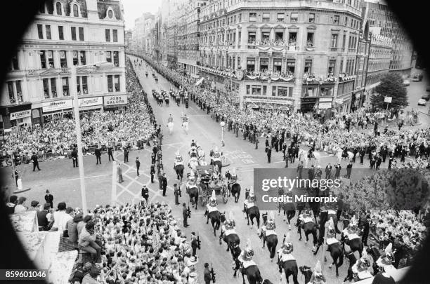 Prince Charles, The Prince of Wales, marries Lady Diana Spencer. Picture shows Charles and Diana riding in a horse drawn carriage away from St Paul's...