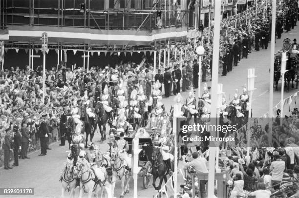 Prince Charles, The Prince of Wales, marries Lady Diana Spencer. Picture shows Charles and Diana riding in a horse drawn carriage away from St Paul's...