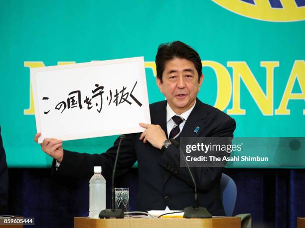 Japanese Prime Minister and ruling Liberal Democratic Party President Shinzo Abe attends a party leaders debate at Japan National Press Club on...