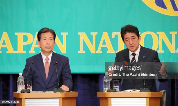 Japanese Prime Minister and ruling Liberal Democratic Party President Shinzo Abe and its junior coalition Komeito leader Ntsuo Yamaguchi attend a...