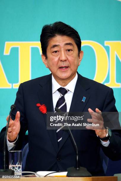 Japanese Prime Minister and ruling Liberal Democratic Party President Shinzo Abe speaks during a party leaders debate at Japan National Press Club on...