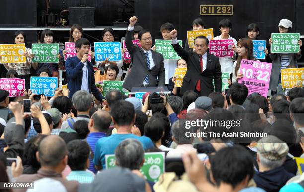 Japanese Communist Party leader Kazuo Shii and Social Democratic Party leader Tadatomo Yoshida attend a joint speech with the Constitutional...