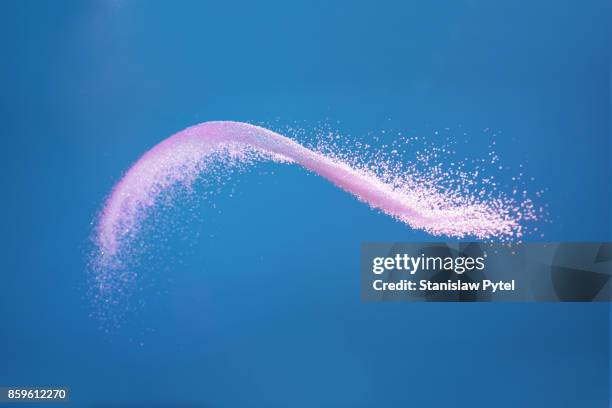 abstract pink/white wave on blue background - particle stock-fotos und bilder