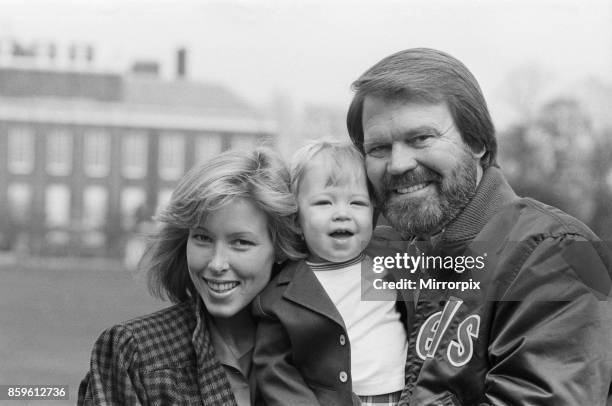 Glen Campbell and his wife Kim and one year old son Cal, in London, 19th April 1984.