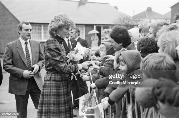 The Prince and Princess of Wales visit Mid Glamorgan in Wales. On this visit, they meet the local well-wishers outside a newly electronics plant....