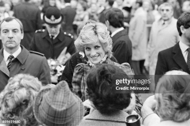 The Prince and Princess of Wales visit Mid Glamorgan in Wales. On this visit, they meet the local well-wishers outside a newly electronics plant....