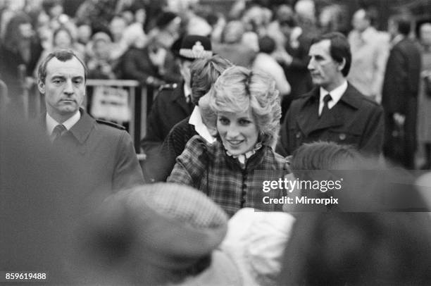 The Prince and Princess of Wales visit Mid Glamorgan in Wales. On this visit, they meet the local well-wishers outside a newly electronics plant....