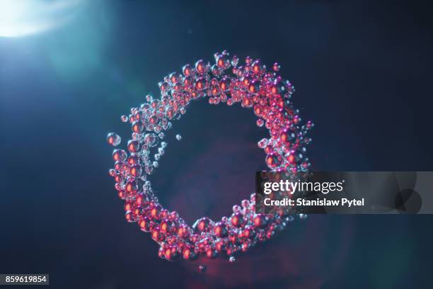 metal spheres forming a circle in the air - chemistry set stock pictures, royalty-free photos & images