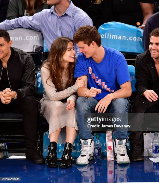 Violetta Komyshan and Ansel Elgort attend Houston Rockets Vs. New York Knicks game at Madison Square Garden on October 9, 2017 in New York City.