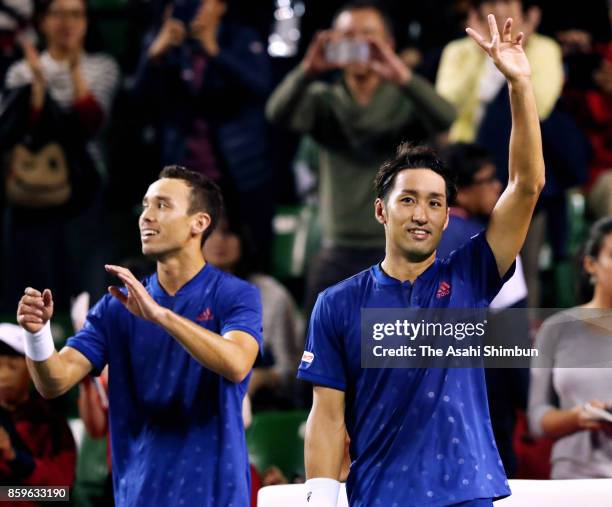 Ben McLachlan of Japan and Yasutaka Uchiyama of Japan celebrate winning their men's doubles semi final match against Santiago Gonzalez of Mexico and...