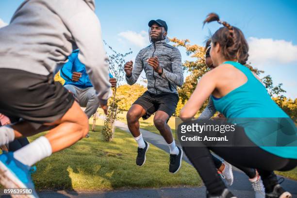 we can jump higher - circuit training stock pictures, royalty-free photos & images