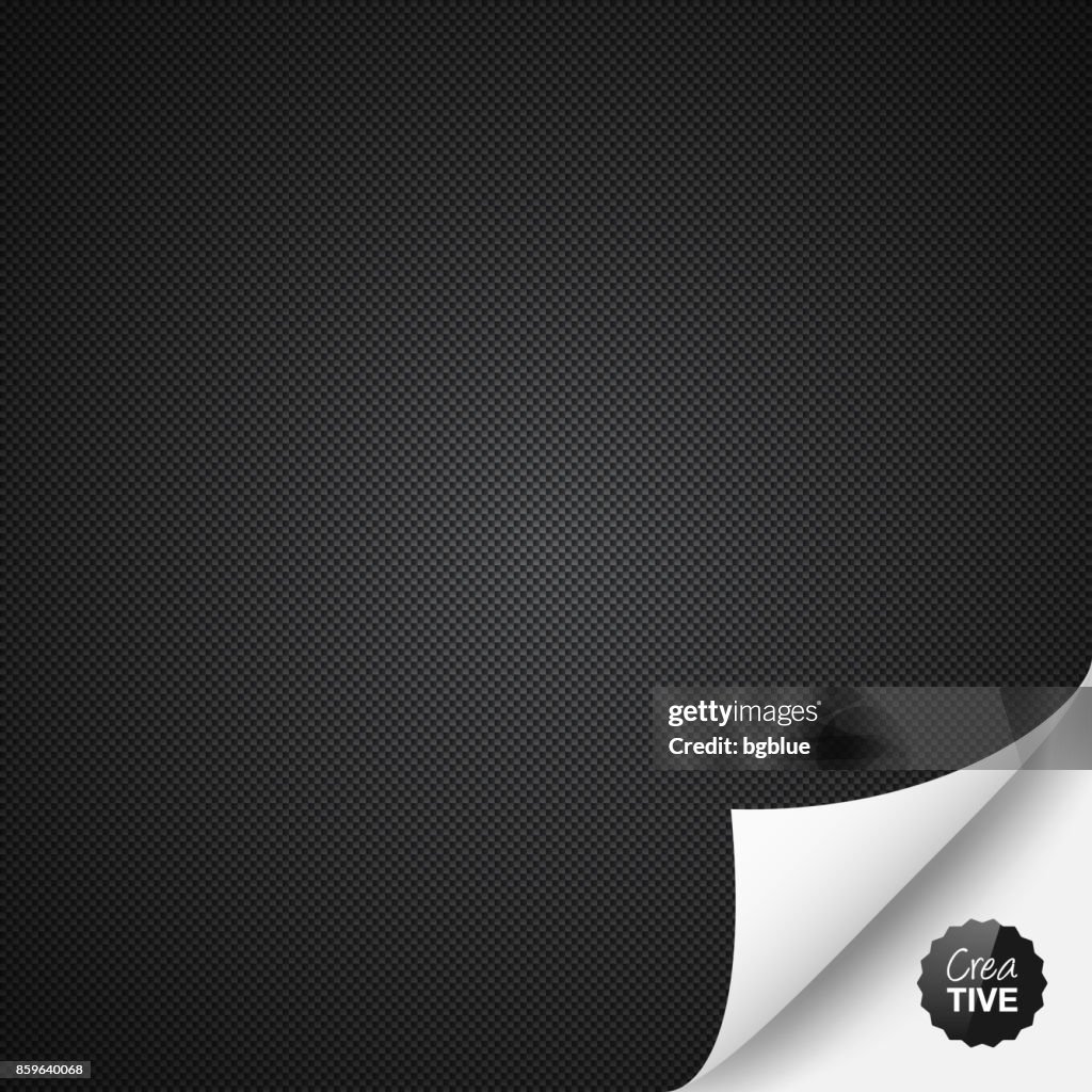 Carbon fiber background with curled page