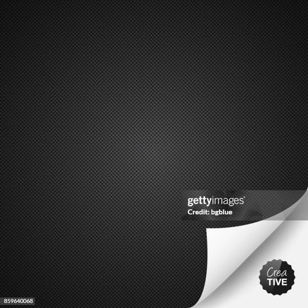 carbon fiber background with curled page - carbon paper stock illustrations