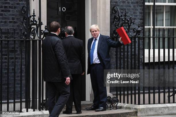 Foreign Secretary Boris Johnson looks towards journalists as he arrives in Downing Street ahead of a Cabinet meeting on October 10, 2017 in London,...