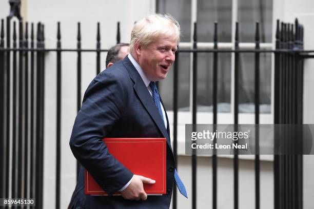 Foreign Secretary Boris Johnson looks towards journalists as he arrives in Downing Street ahead of a Cabinet meeting on October 10, 2017 in London,...