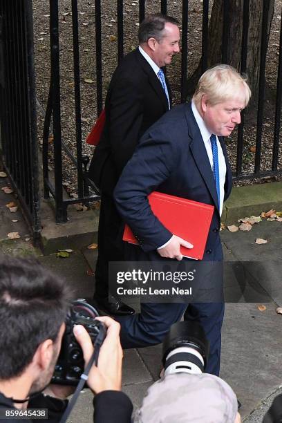 International Trade Secretary Liam Fox and Foreign Secretary Boris Johnson arrive in Downing Street ahead of a Cabinet meeting on October 10, 2017 in...