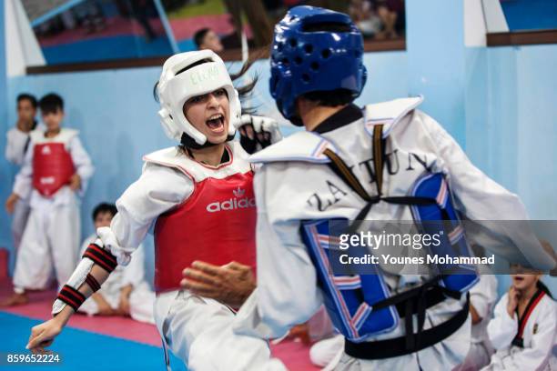 Members of the Malek Taekwondo Centre take part in classes in Erbil, Iraq on August 30, 2017. The Centre, one of many in Erbil, is owned and run by a...