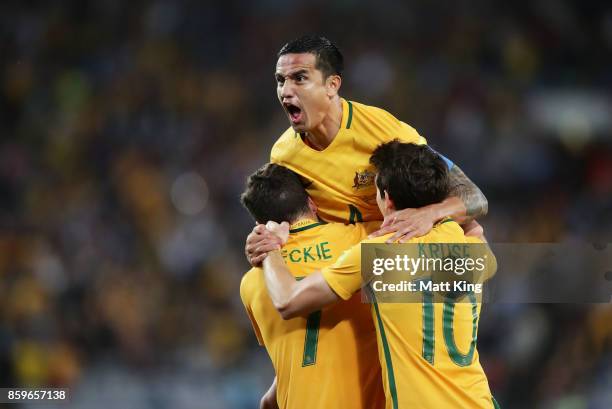 Tim Cahill of Australia celebrates scoring their first goal during the 2018 FIFA World Cup Asian Playoff match between the Australian Socceroos and...